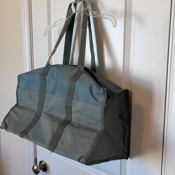 New roomy green sage colored duffle bag, outside pocket, full zipper closure. - Picture 3 of 7